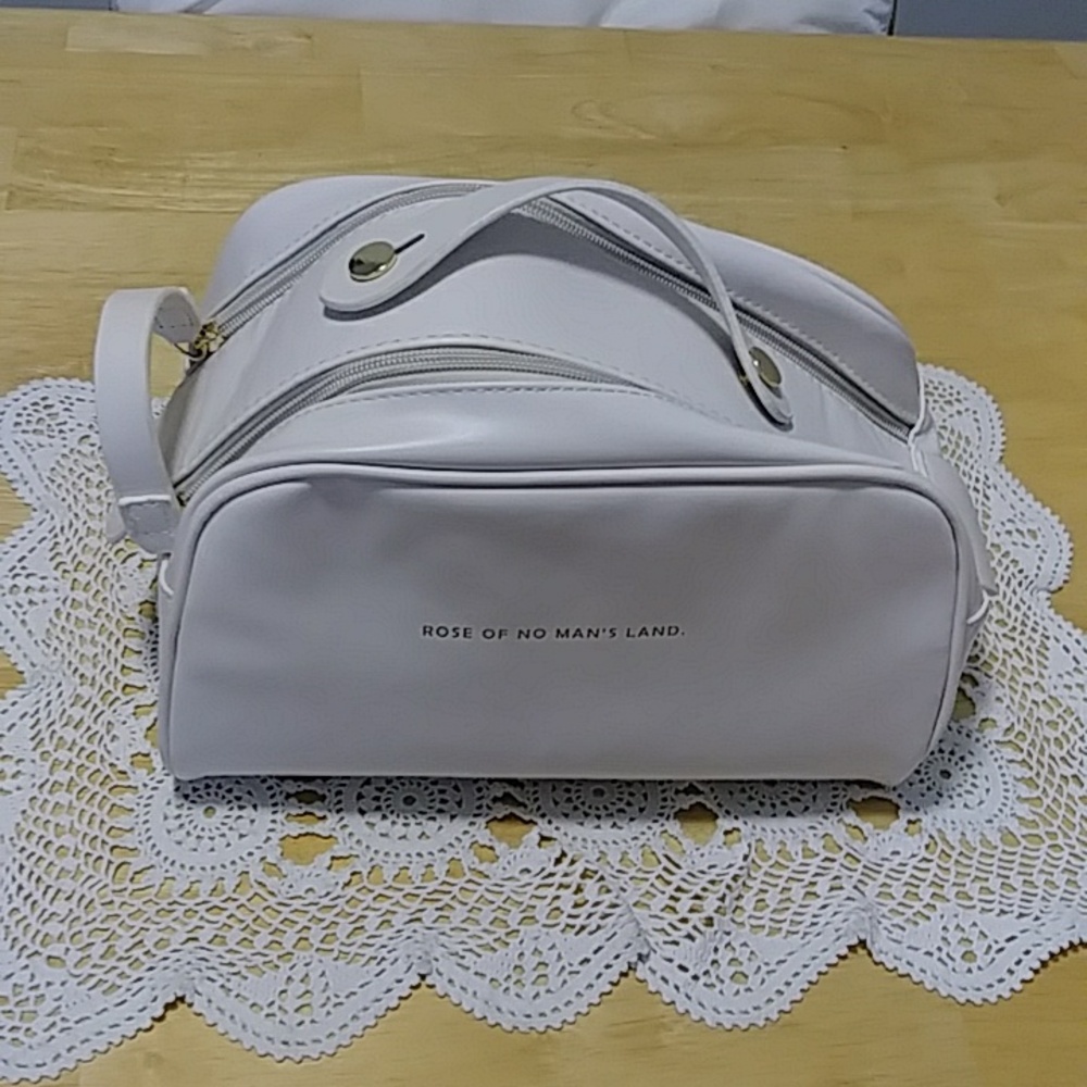 Make up or toiletries bag, Rose of No Man's Land brand